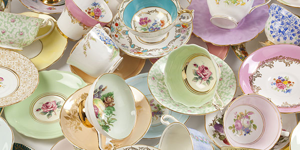 Highly decorated bone china cups and saucers
