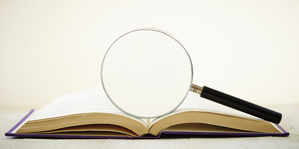 Magnifying book on book