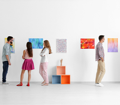 people viewing modern art in a gallery