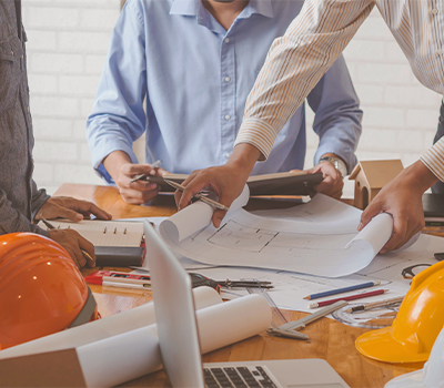 Surveyors looking at home extension plans